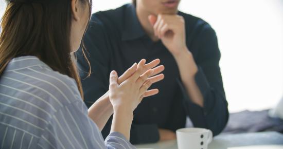 Two people having a conversation