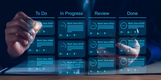 close up of a person in business suit interacting with a kanban board